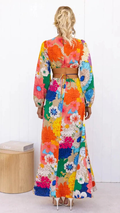 Maria - Robe longue à imprimé floral, dos ouvert et détails élastiques